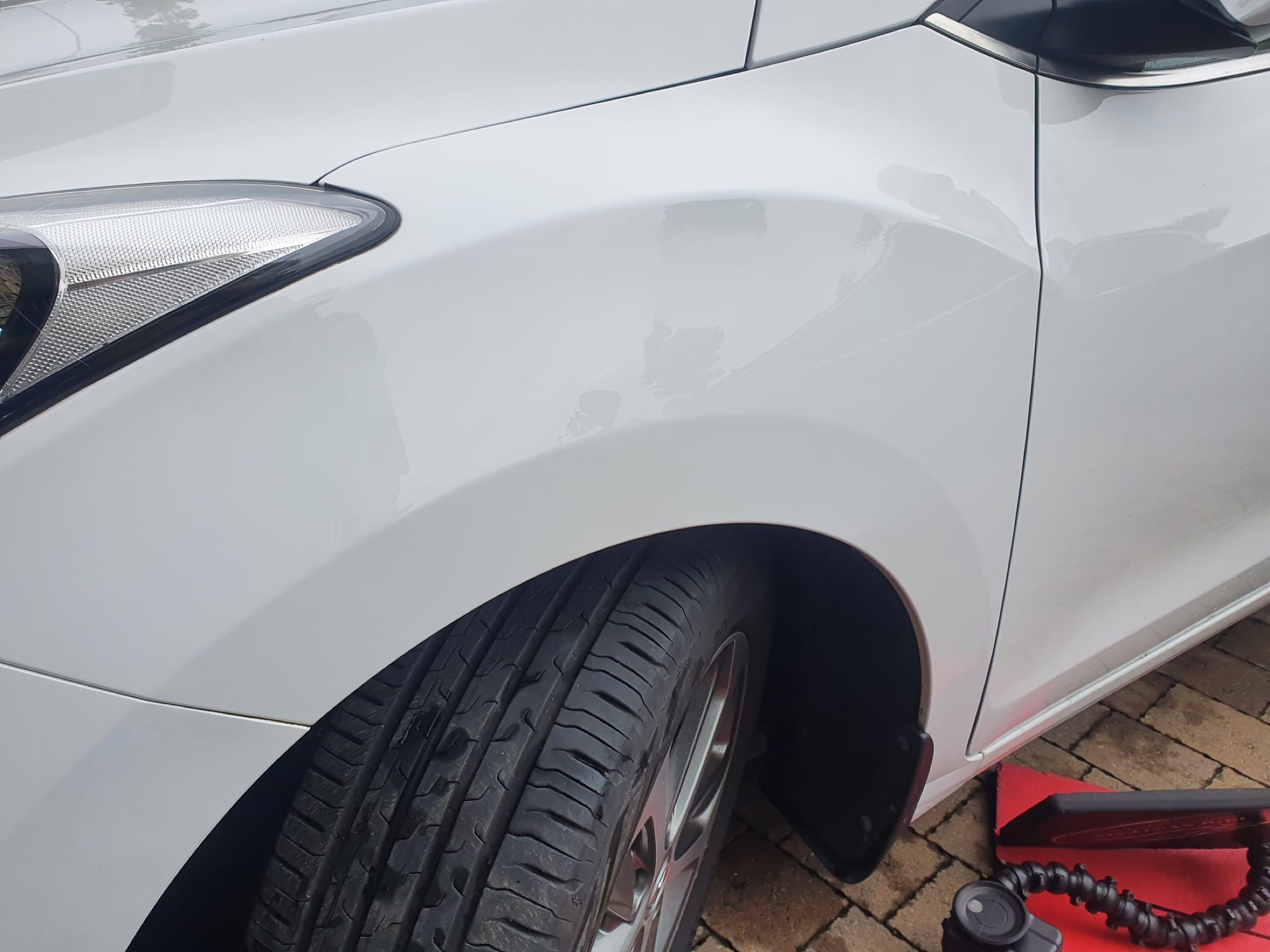 Front wing after paintless dent repair